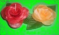 velas en forma de rosa