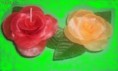 velas en forma de rosa